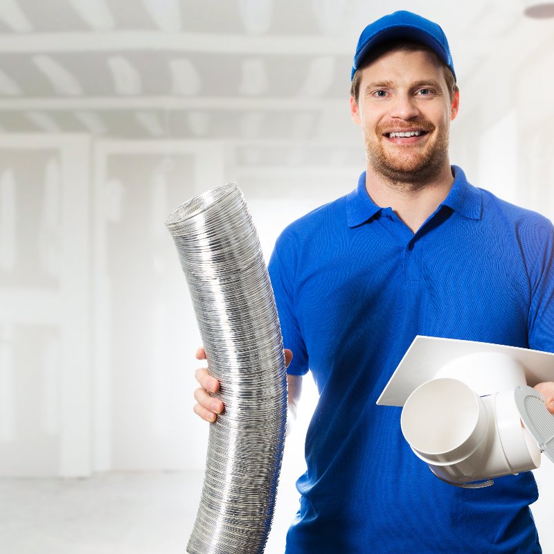 worker holding air duct equipment